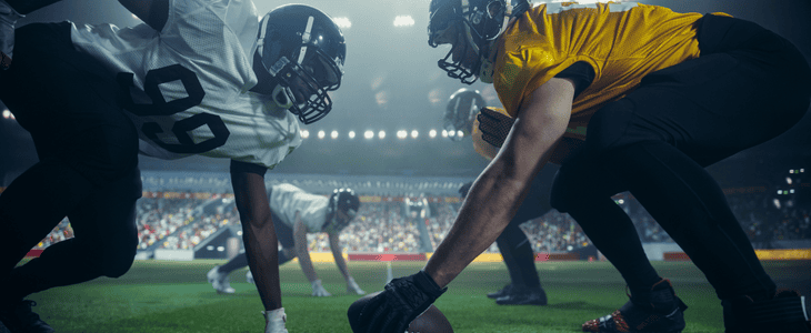 American football players on the field preparing for kickoff